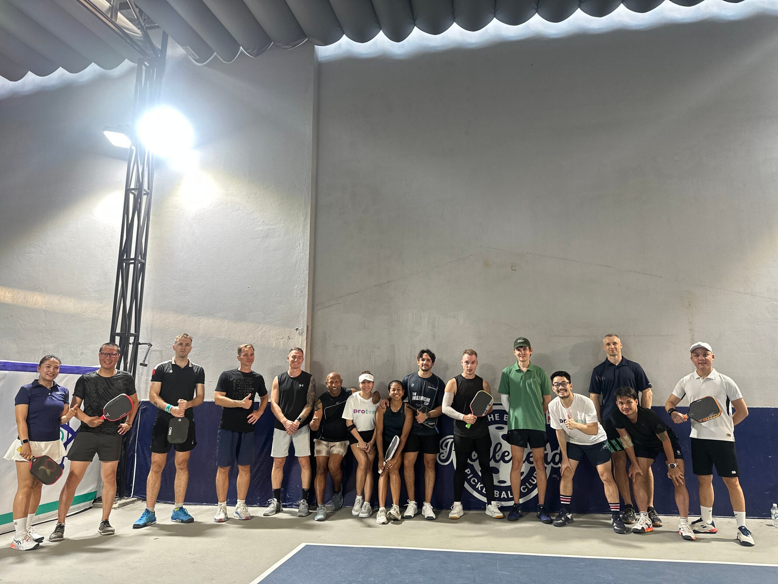 Coach-ho-organized-a-social-play-of-pickleball-in-da-nang-for-tourists-and-local-players.